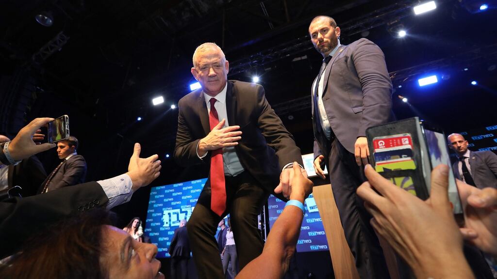 Benny Gantz, leader and candidate of the Israel Resilience party that is part of the Blue and White (Kahol Lavan) political alliance, shakes hands with supporters in Tel Aviv. Photograph: Gali Tibbon/AFP