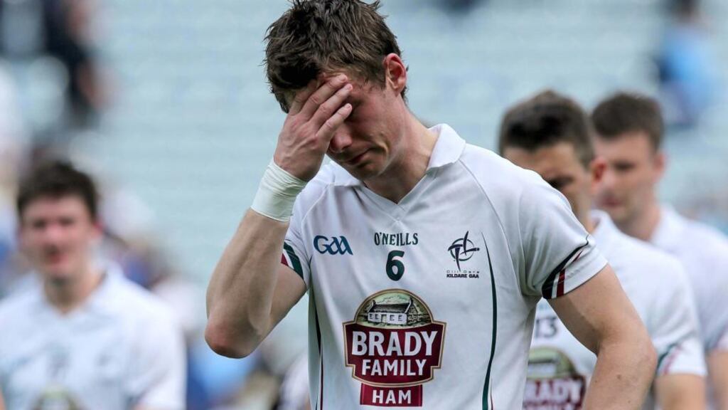 Kildare’s Emmet Bolton feels the pain following the heavy Leinster semi-final defeat by Dublin.  Photograph: Donall Farmer/Inpho