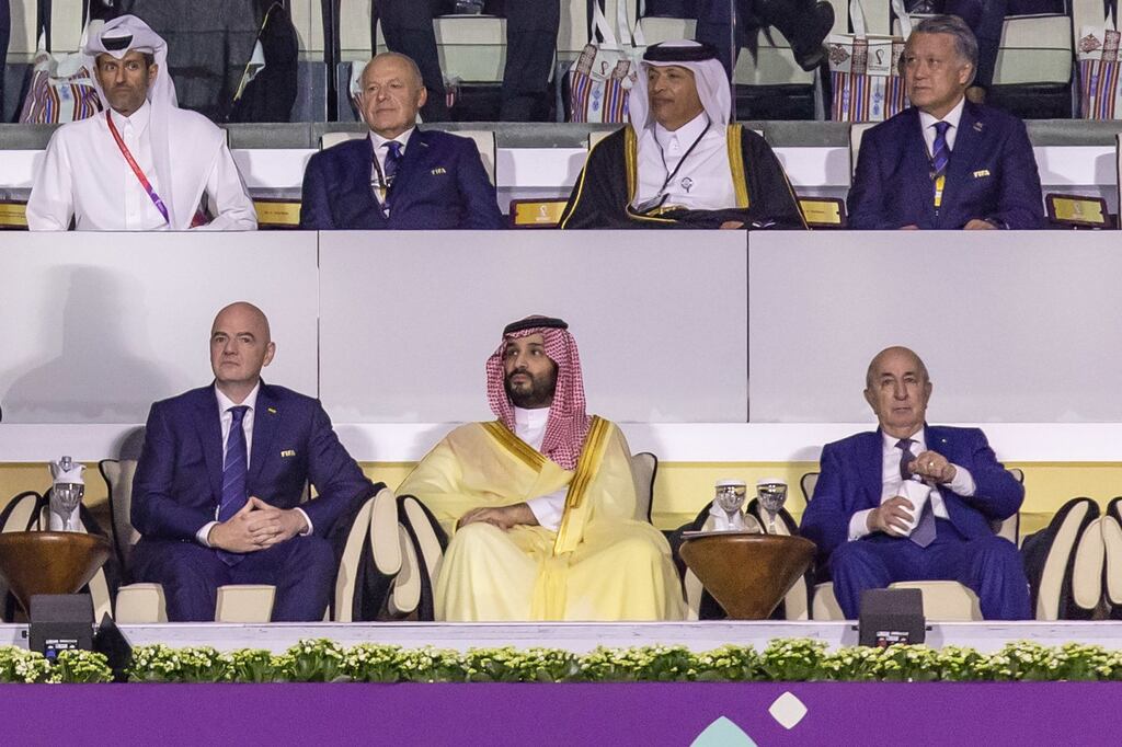 Fifa president Gianni Infantino (front row left) sits beside Mohammad bin Salman, Saudi Arabia's crown prince, during the opening ceremony of the World Cup at Al Bayt Stadium in Al Khor, Qatar, on Sunday. Photograph: Christopher Pike/Bloomberg
