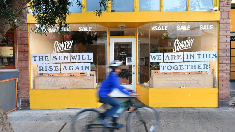 A storefront in San Francisco during the coronavirus outbreak. The US death toll climbed past 7,000 on Friday. Photograph: Josh Edelson/AFP.