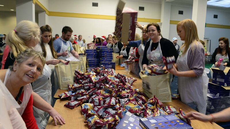 Packing lunches at the Knights of St Columbanus Christmas dinner at the RDS. Photograph: Cyril Byrne/The Irish Times