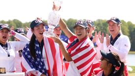 USA hold off Europe fightback to lift Solheim Cup