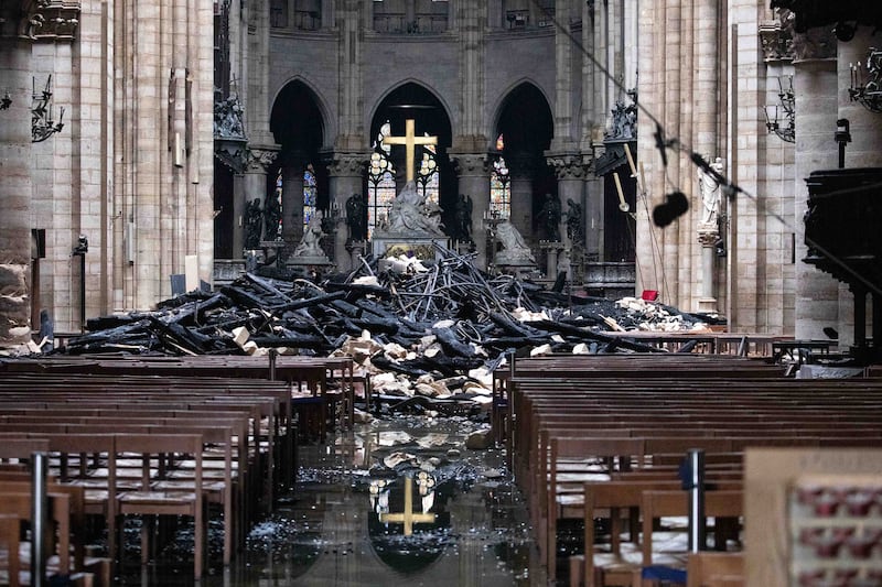 Fallen debris from the burnt-out roof structure sits near the altar inside Notre Dame cathedral on April 16th, 2019. Photograph: Christophe Morin/Bloomberg via Getty Images
