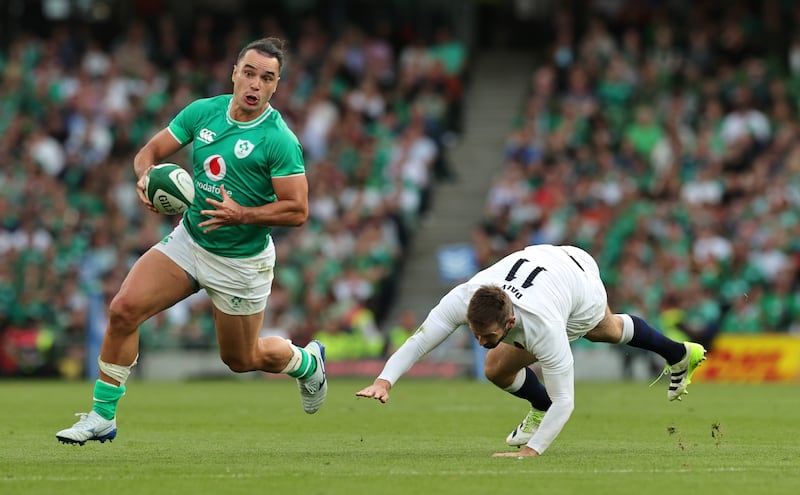 James Lowe goes past England's Elliot Daly during the summer international match at the Aviva Stadium. Photograph: David Rogers/Getty Images