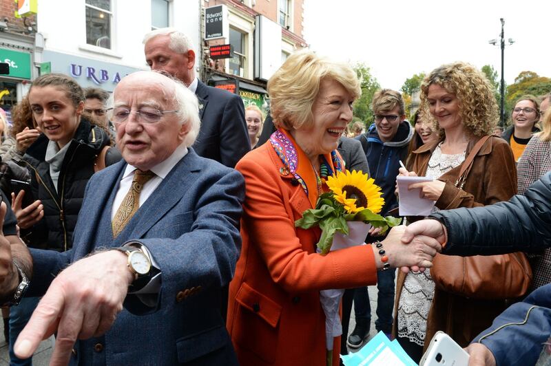 MEETING THE PEOPLE: Presidential nomination Michael D Higgins and his wife Sabina meeting people during a canvas on Grafton Street. Photograph: Cyril Byrne/The Irish Times