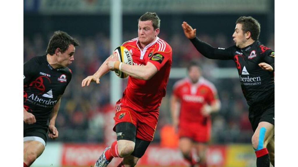 Munster's Denis Hurley tries to break the Edinburgh line during February's Magners League game. Hurley has been recalled to the Munster squad. Photograph: Colm O'Neill/Inpho