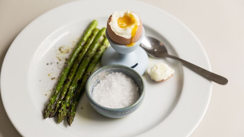 Boiled eggs and asparagus soldiers. Photograph: Emma Jervis