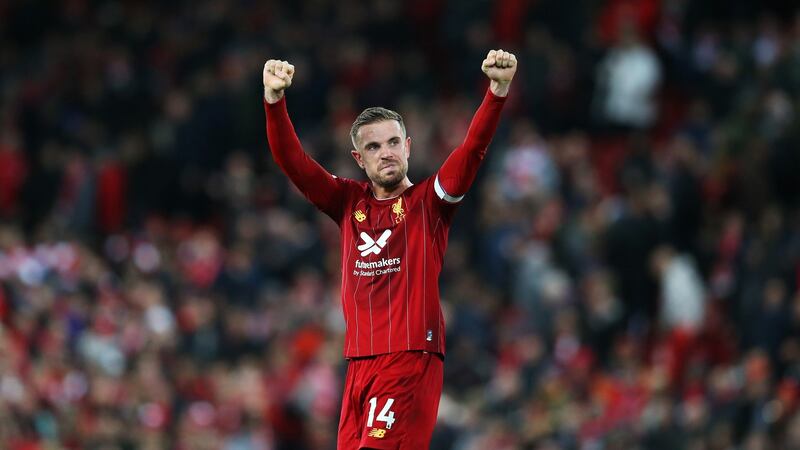 Jordan Henderson will lift the Premier League trophy, but there will be none of the exuberance and sheer joy visible when, for instance, Leicester did it four years ago. Photograph: Jan Kruger/Getty Images