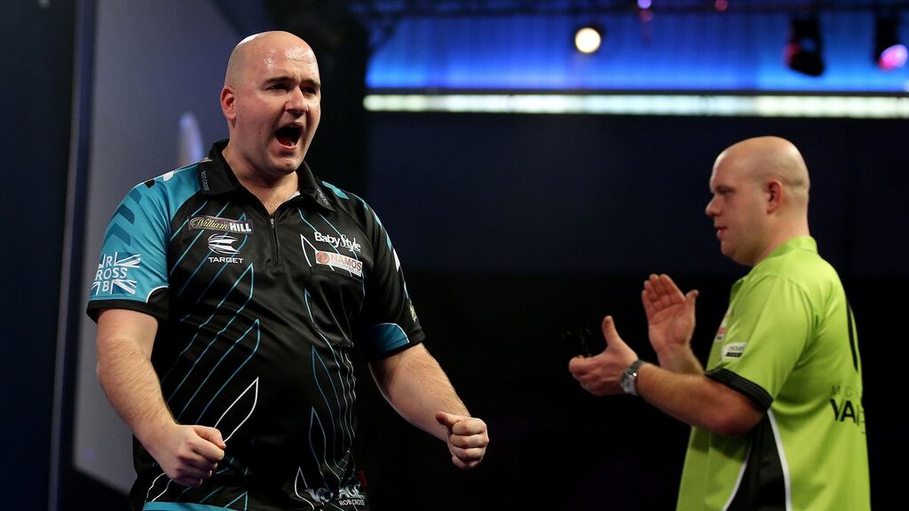 Rob Cross beat Michael van Gerwen in sudden death to reach the World Championship final. Photograph: Steve Paston/PA