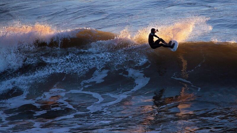 Surfing on Inch Strand, Co Kerry.