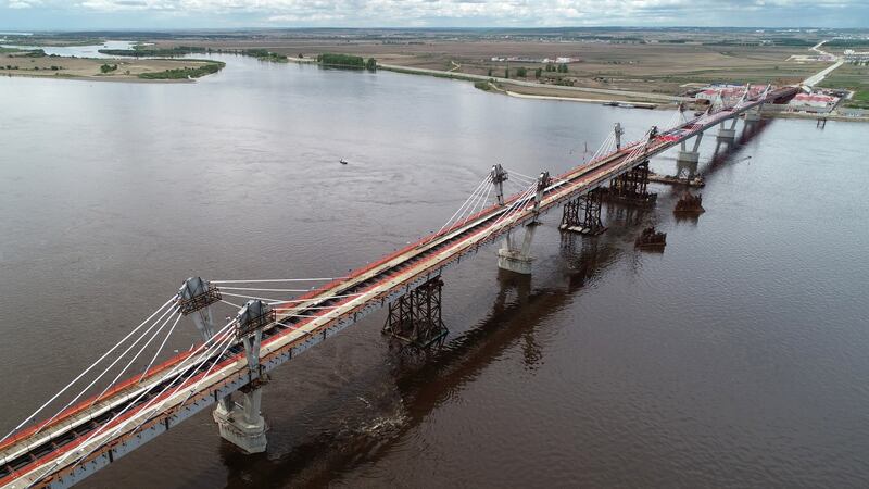 The bridge spanning the Amur river connecting Blagoveshchensk and Heihe under construction in 2019. Photograph: Yuri Smityuk\TASS via Getty Images