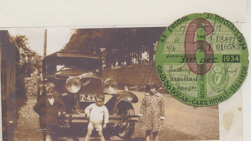 Michael McGrath with his brother Denis and sister Vera, proudly posing with their father’s car