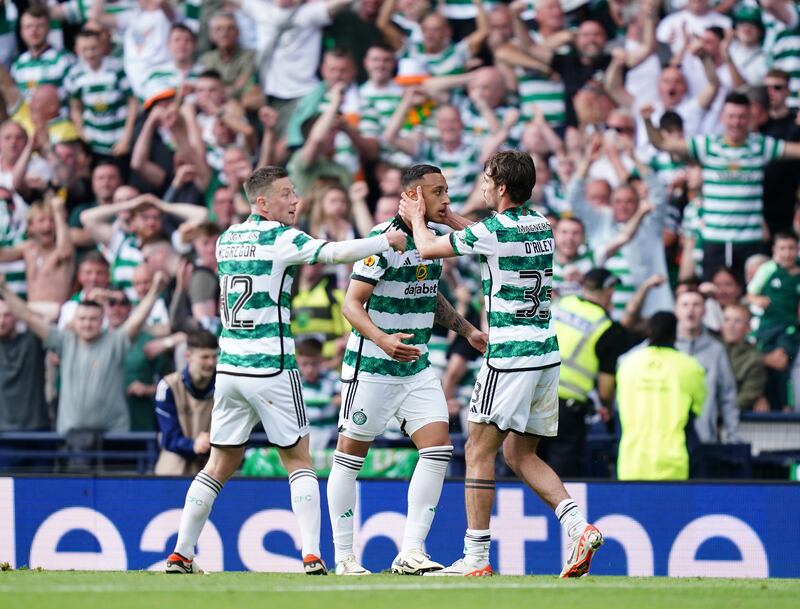 Celtic’s Adam Idah (centre) celebrates with Celtic's Callum McGregor (left) and Celtic’s Matt O'Riley (right) after scoring their side's first goal of the game during the Scottish Gas Scottish Cup final at Hampden Park, Glasgow. Picture date: Saturday May 25, 2024. PA Photo. See PA story SOCCER Scottish Cup. Photo credit should read: Jane Barlow/PA Wire.
RESTRICTIONS: Use subject to restrictions. Editorial use only, no commercial use without prior consent from rights holder.