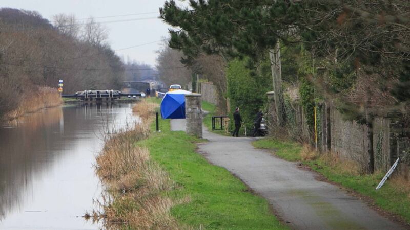 Gardai at the scene in Ardclough following the discovery of human remains which where found in a suitcase at the Grand Canal in Co Kildare. Photograph: Gareth Chaney/Collins