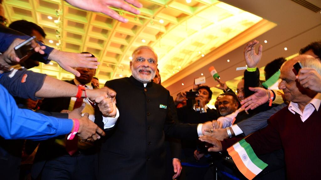 Members of the Indian community welcoming prime minister of India, Narendra Modi, to Ireland in 2015. Photograph: Dara Mac Dónaill