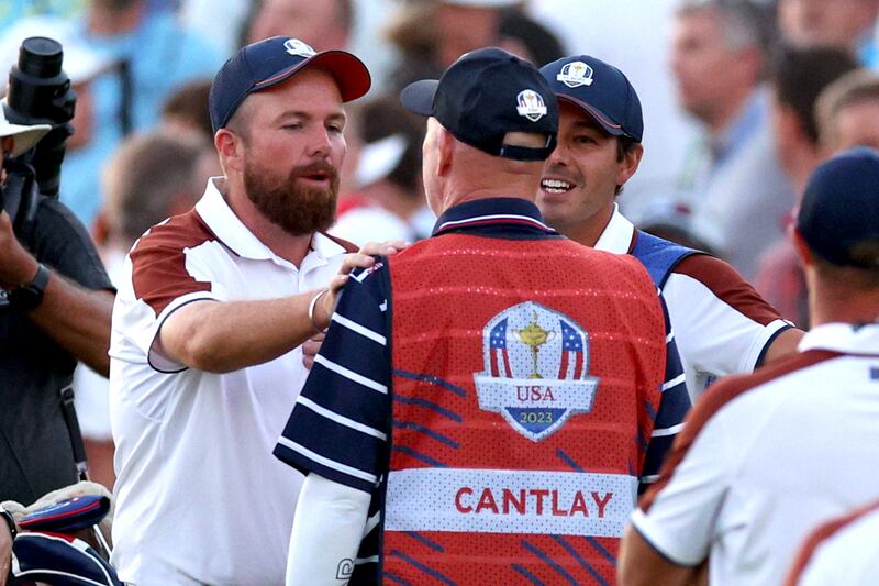 Shane Lowry has a frank exchange of views with caddie Joe LaCava during the 2023 Ryder Cup. Photograph: Andrew Redington/Getty Images