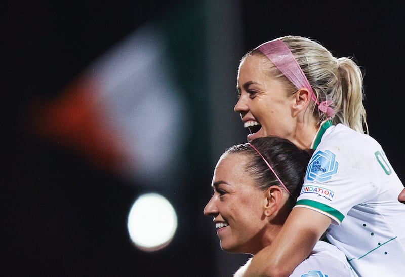 Katie McCabe celebrates with Denise O'Sullivan after completing her hat-trick by scoring the Republic of Ireland's fifth goal against Albania at Tallaght Stadium. Photograph: Tom Maher/Inpho