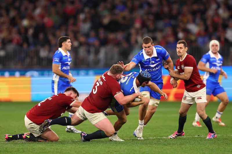 Hamish Stewart of the Force gets tackled by Tadhg Furlong of the Lions. Photograph: Paul Kane/Getty