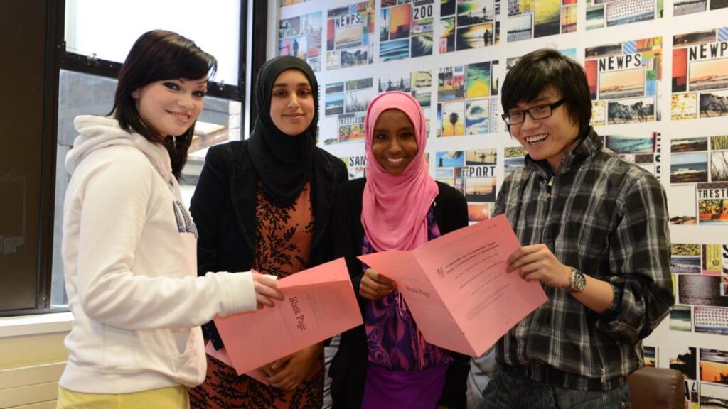 Leaving Cert students from left Kate Melligan, Celbridge, Ferial Smew, Lucan, Sumayya Mukhtar, Clonskeagh and Trieu Nguyen, Lucan, preparing to sit their final exams in Italian and Japanese at the Institute of Education, in Dublin, in June. Photograph: Cyril Byrne