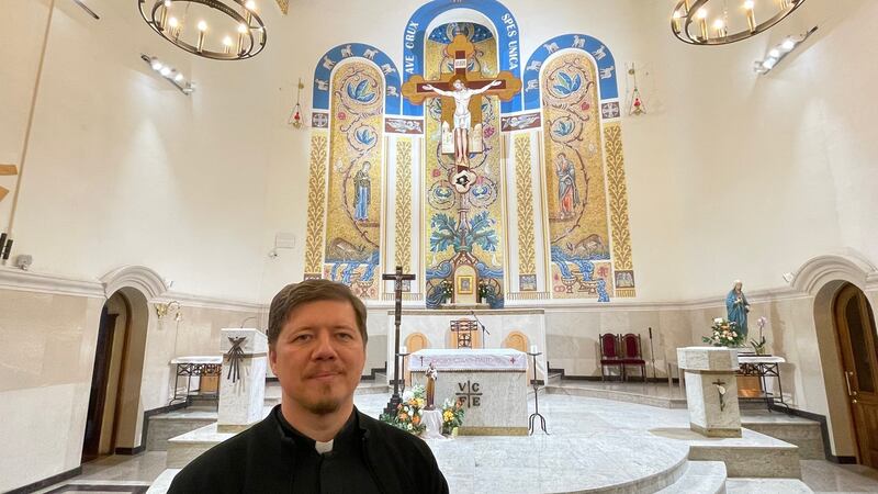 Catholic priest Fr Andrei Startsev inside the Church of the Exaltation of the Holy Cross in Kazan, Russia, a city known for its religious diversity and tolerance. Photograph: Daniel McLaughlin