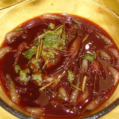 Drunken shrimp: in this Chinese dish, tiny shrimp are submerged in alcohol and eaten alive; they survive long enough to squirm in the mouth. Photograph: James Creegan/Flickr