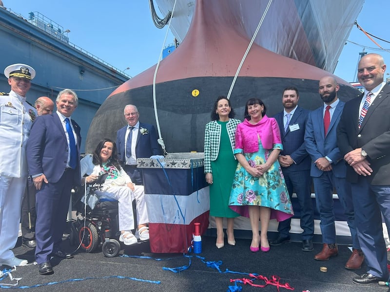 Minister of State Seán Fleming at the ship's launch along with members of the Gallagher family.