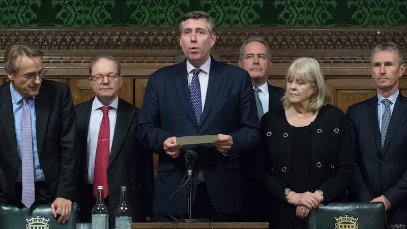 Graham Brady (holding paper), chairman of the 1922 Committee, announces that Theresa May has survived an attempt by Tory MPs to oust her as party leader, at the Houses of Parliament in London. Photograph: Stefan Rousseau/PA Wire