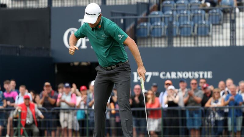 England’s Justin Rose celebrates his birdie on the 18th during the third round of the British open at Carnoustie. Photograpgh:  PA Wire