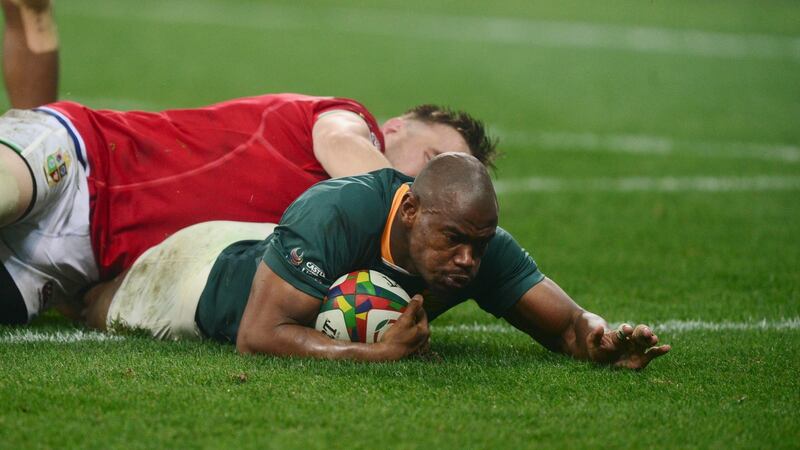Makazole Mapimpi of South Africa scores a try during the second Test in Cape Town. Photograph: EPA