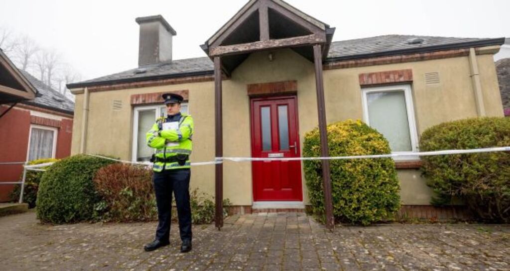 A garda outside the house on Maudlin Street in Kilkenny. Photograph: Dylan Vaughan