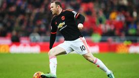 Wayne Rooney could miss two months with knee ligament injury