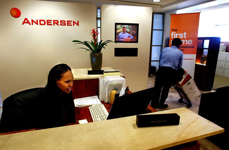 Employees in the office of Arthur Andersen financial company. Photograph: Carolyn Cole/Los Angeles Times via Getty Images