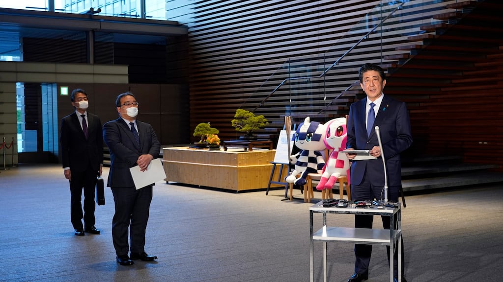 Japan’s prime minister,  Shinzo Abe, prepares to speak to reporters in Tokyo on Monday ahead of a meeting about the coronavirus pandemic. Photograph: Franck Robichon/EPA