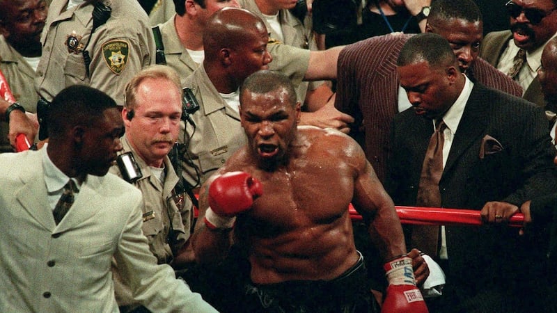 Mike Tyson throws a fit in the ring following his bout with Evander Holyfield at the MGM Grand Garden in Las Vegas, on June 28th, 1997. Tyson had been taken off antidepressant drugs two days before he became enraged and threw a TV set in a Maryland jail. Photo: Lennox Mclendon/AP Photos