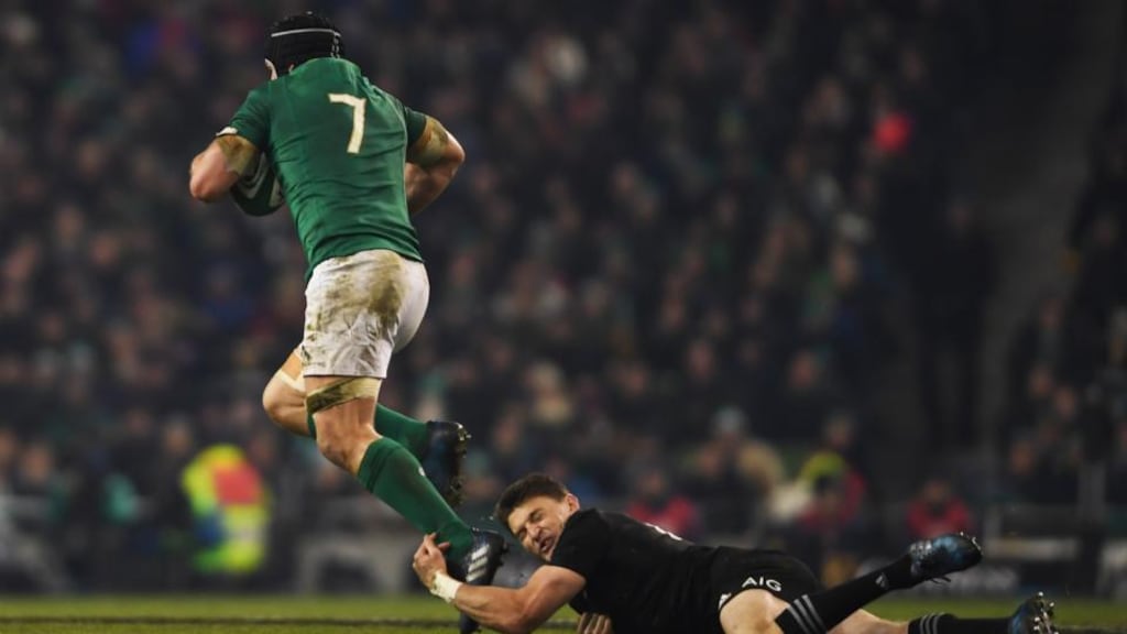 A rampaging Seán O’Brien gets away from Beauden Barrett at the Aviva Stadium. Photograph: Mike Hewitt/Getty Images