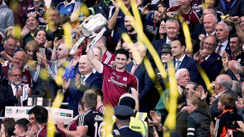 Galway’s David Burke lifts the Liam MacCarthy Cup after they beat Waterford to win the All-Ireland. Photo: Tommy Dickson/Inpho