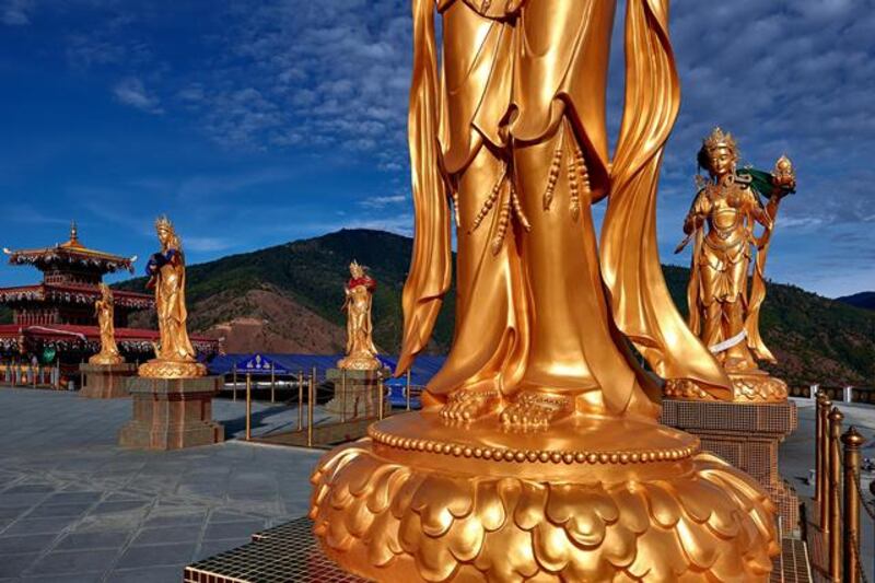 Buddhist statues in Thimphu, Bhutan. Photograph: New York Times