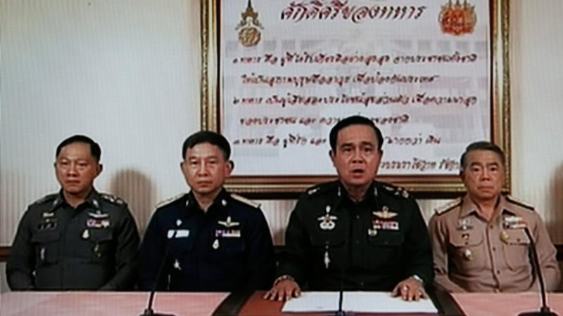 A Thai soldier stands guard after a curfew started at 10pm in Bangkok, Thailand. Photograph: Paula Bronstein/Getty Images