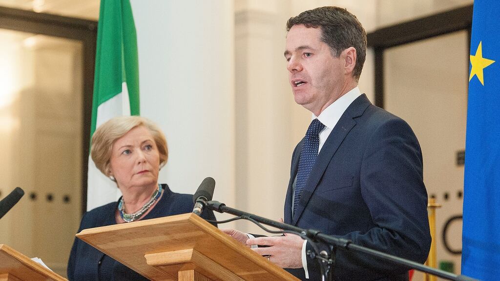 Minister for Justice Frances Fitzgerald and the Minister for Public Expenditure and  Reform Paschal Donohoe at yesterday’s joint press conference. Photograph: Dave Meehan