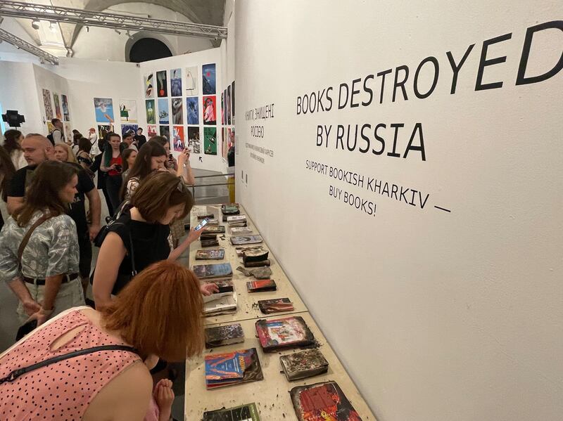 Books burned in a deadly Russian missile attack on a Kharkiv printing house in May were put on display by the Vivat. Photograph: Daniel McLaughlin