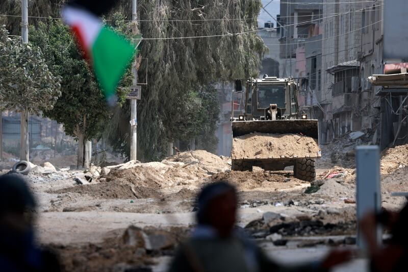 An Israeli army bulldozer digs up a road in the Nur Shams refugee camp in Tulkarem on the second day of a large-scale military operation in the north of the occupied West Bank on August 29th. Photograph: Jaafar Ashtiyeh/AFP via Getty Images