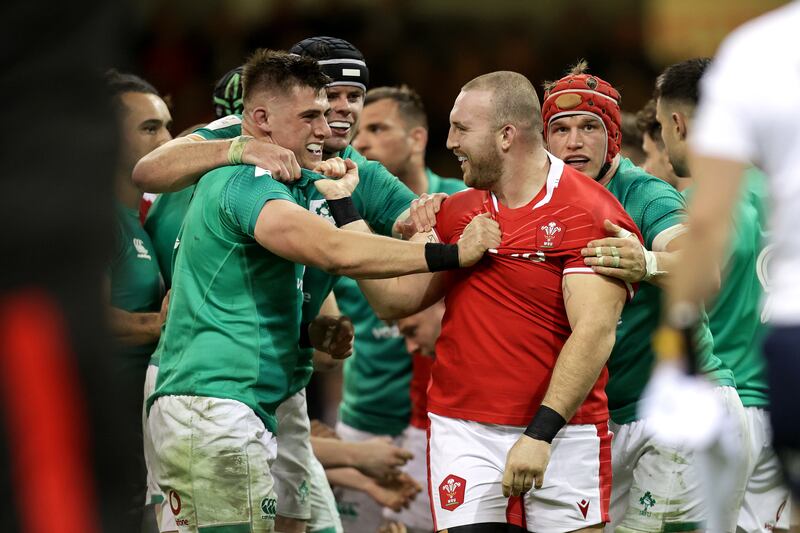 Ireland’s Dan Sheehan, James Ryan and Josh van der Flier exchange views with Dillon Lewis of Wales. Photograph: Laszlo Geczo/Inpho
