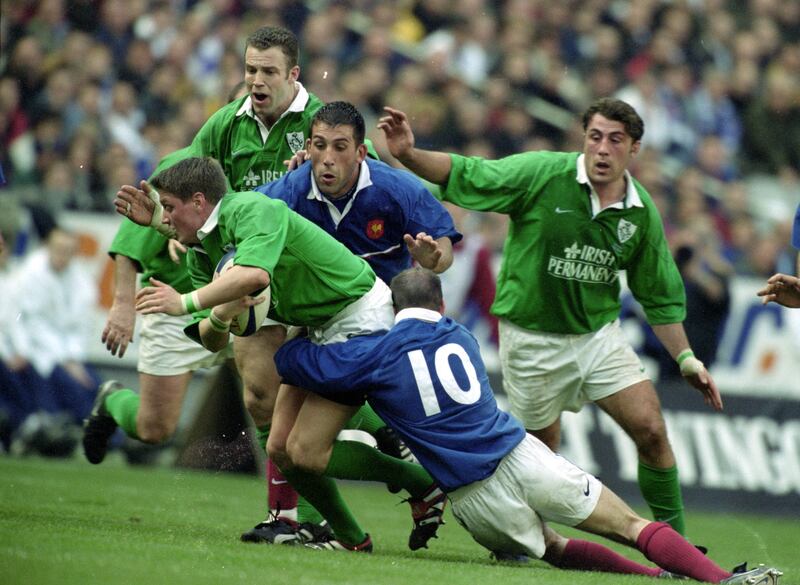 Arnaud Costes tackles Ronan O'Gara during the 2000 Six Nations clash between France and Ireland. Photograph: Dave Rogers/Allsport