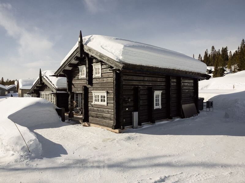 Norway, Trysilfjellet: log cabin has four/five bedrooms, two bathrooms, three reception rooms and a sauna.