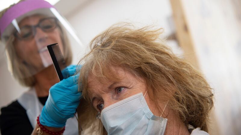 Aileen McKinley styles Carmel Dunleavy’s hair in Haircraft Hair & Beauty salon. Photograph: Joe Dunne