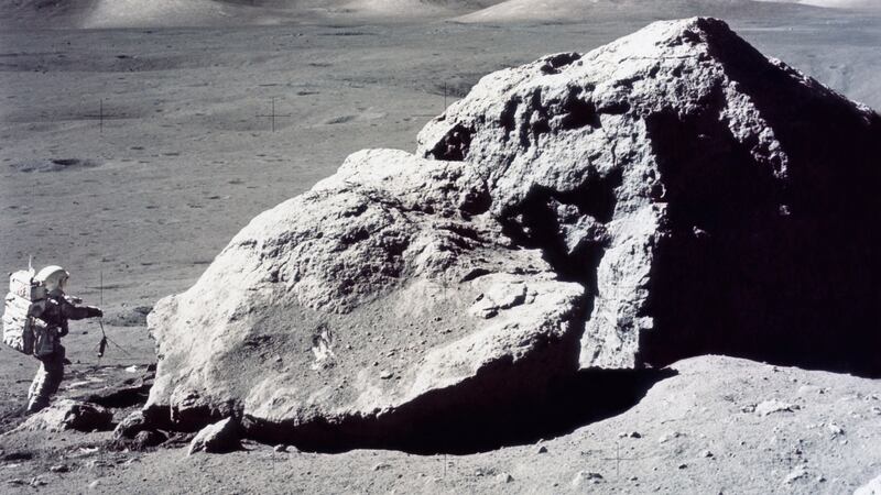 Harrison Hagan Schmitt takes rock samples from Moon during America’s last lunar landing mission of the 20th century, Apollo 17, on December 1972. Photograph: Space Frontiers/Getty Images