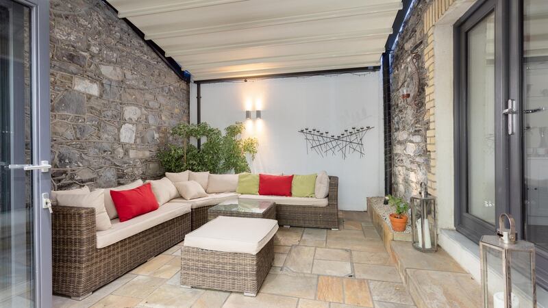 Courtyard at number 4 Sussex Terrace, Dublin 4 has an electronic awning