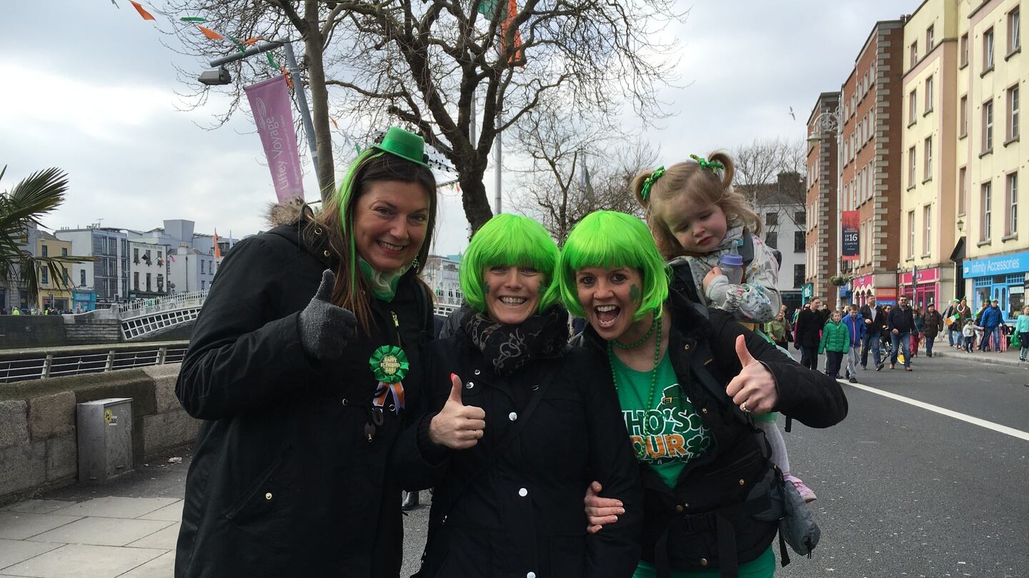 Marta Wloszczak from Melbourne, Jenny Mountain from Yorkshire and Carol Curtis and Abbey from Dublin at the St Patrick’s Day parade. Photograph: Sorcha Pollak