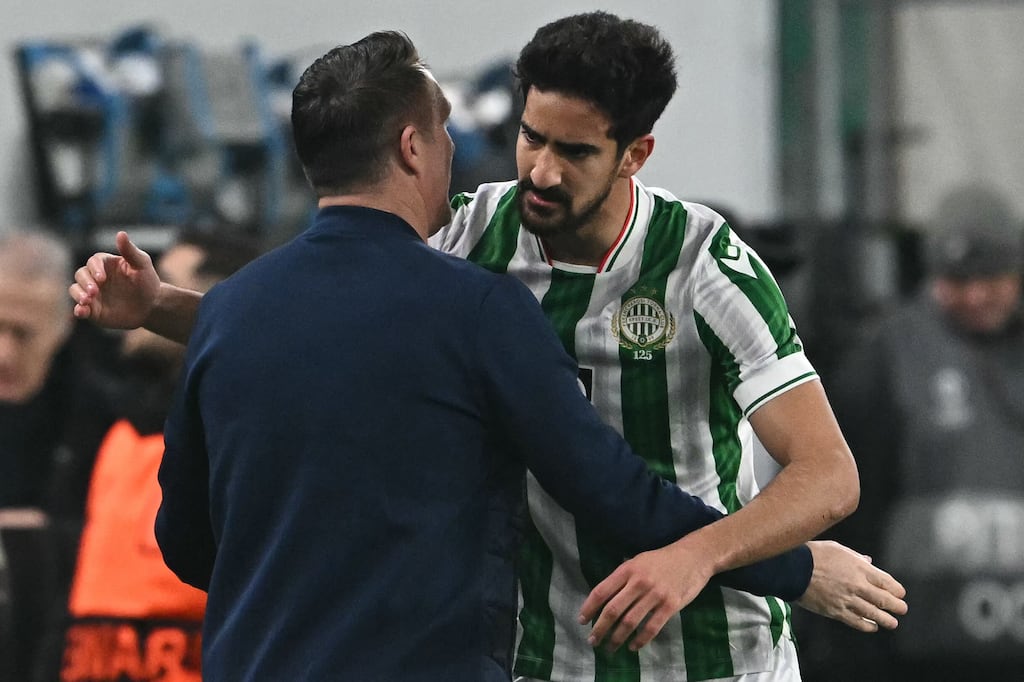 Ferencváros manager Robbie Keane celebrates with Mohamed Ali Ben Romdhane after he score the first goal in the Uefa Europa league football match against AZ Alkmaar at the Groupama Arena in Budapest. Photograph: Attila Kisbenedek/AFP via Getty Images