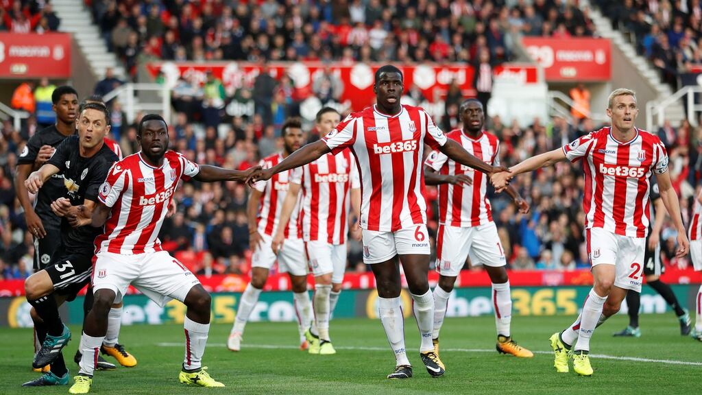 The Stoke players defend a set piece. Photograph: Carl Recine/Reuters